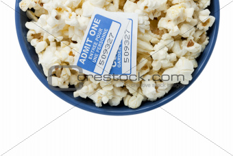 blue bowl with popcorn and cinema tickets