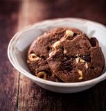 Chocolate chip cookies with nuts in a bowl