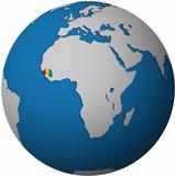 guinea flag on globe map