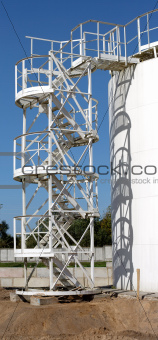 White storage tank with stairs