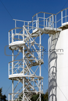 White storage tank with stairs