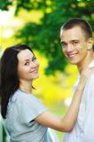 young couple in summer park