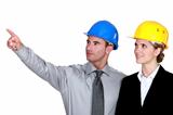 businessman and businesswoman on a construction site