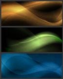 Set of abstract wave patterns on dark background