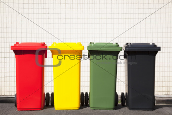four colors recycle bins on the street