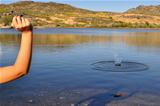 Woman Throwing a Stone