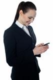 Corporate lady reading sms