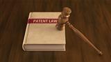 Patent law book with gavel on it