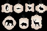Vintage stickers with silhouettes of animals isolated on black