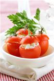 appetizer of stuffed tomatoes (soft cheese and parsley)