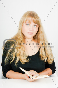 blonde girl with a book