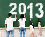 happy family drawing 2013 on the chalkboard