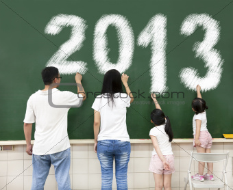 happy family drawing 2013 on the chalkboard