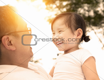 happy little girl with father