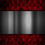 Metal plate on a floral grunge background