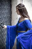 medieval girl opening door