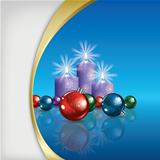 Christmas background with decorations and candles on blue