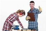 Couple working at a workbench