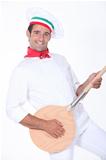 pizza cook playing guitar with a spade