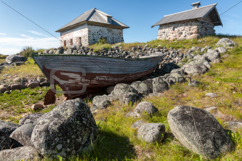  Old boat and stone houses.