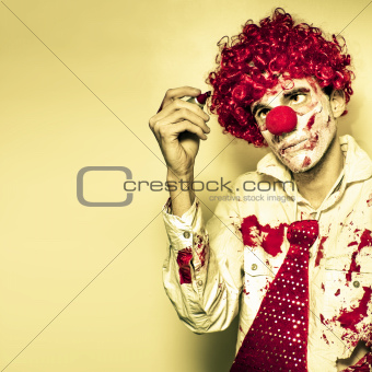 Horror Clown Writing Halloween Message In Blood