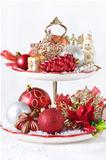 Cupcake stand with christmas decorations.