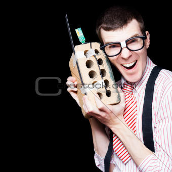 Business Geek Laughing On House Brick Phone