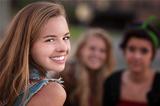 Smiling Teen Girl with Two Friends