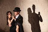 Tango Dancers Under Spotlight