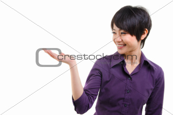 Smiling woman showing copy space for product 