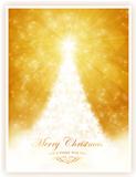 White shiny Christmas tree on sparkling golden background