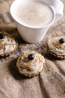raw food cupcakes with a cup of coffee