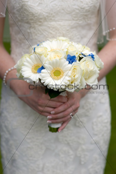 bride holding a wedding bouquet