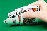 man's hand with four cards