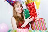 Happy birthday. Attractive young girl with gifts