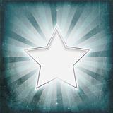 Silver rimmed star on aged light rays parchment