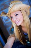 Attractive Blond Model Smiles While Wearing Cowboy Hat