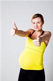Pregnant woman doing thumbs up