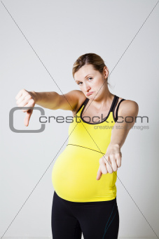 Pregnant woman thumbs down