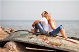couple sitting on old boat