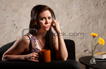 Worried Woman with Cup