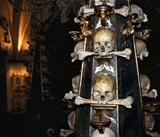 Candlestick with human skulls and bones