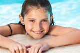 Happy Girl Child In Swimming Pool