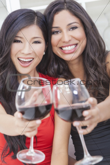 Two Happy Women Friends Drinking Wine Together