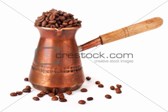 Turkish coffee pot and coffee beans