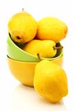 Ripe yellow pears in bowl.