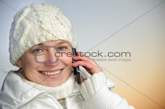 Blue-eyed woman on phone