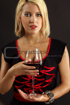 Gorgeous blond drinking red wine