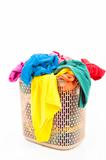 Colorful clothes in a laundry basket