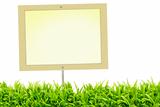 Blank signboard and green grass 